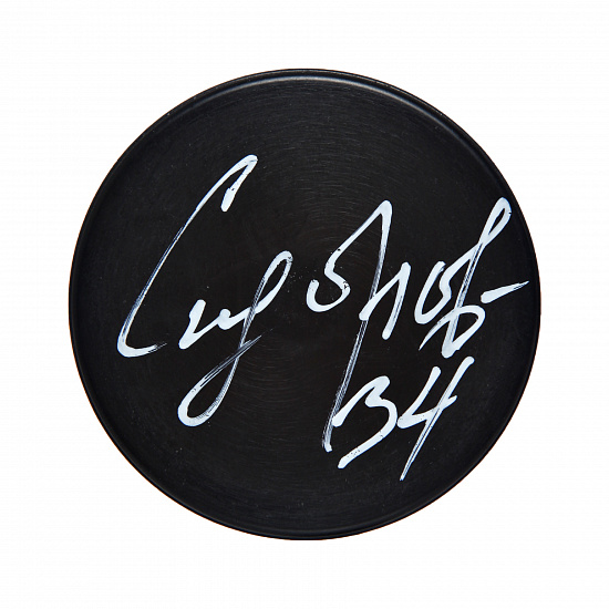 Souvenir puck 21/22 autographed by M. Sidorov (34)